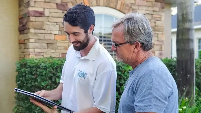 Soap & the City technician with homeowner